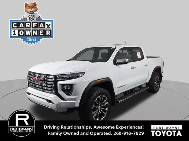 2023 GMC Canyon Denali in Summit White — front three-quarter view