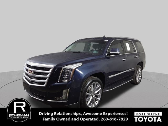 2019 Cadillac Escalade Luxury in Dark Adriatic Blue Metallic — front three-quarter view
