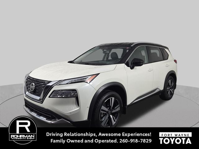 2021 Nissan Rogue Platinum in Pearl White Tricoat/Super Black — front three-quarter view